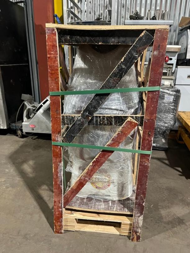 Brand new YQ-S30 commercial dough mixer in shipping crate. Features electric power, stainless steel bowl guard, and mixing bowl.