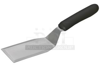 Brand new Winco Winware Series commercial stainless steel hamburger turner, model TKP-61, with black grip handle.