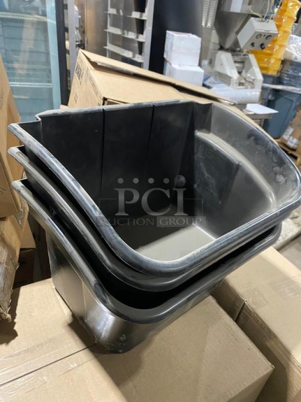 Stacked black Cambro Versa Line self-serve condiment bins on boxed Arcoroc Excalibur series wine glasses. New condition.