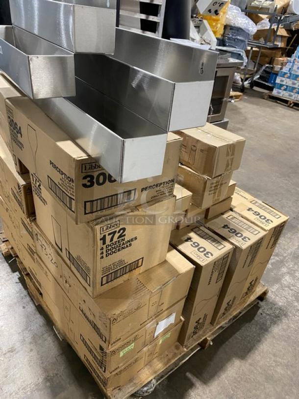 Pallet of new commercial glassware and accessories, including Arcoroc, Libbey glasses, Winco shakers, and more.