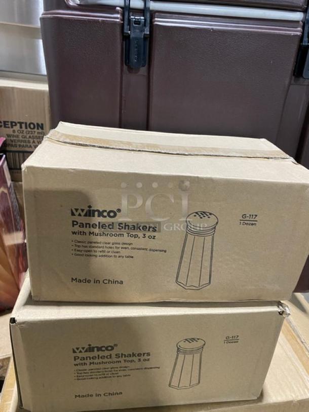 Brand new mixed pallet with Winco 3 oz paneled glass shakers, model G-117, boxed, Made in China, shown on shelves.