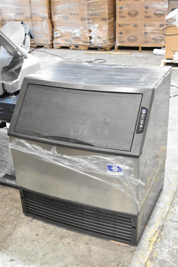 2023 Manitowoc UDF0310A-261Z stainless steel ice machine with 119 lb bin. Scratch and dent condition, wraps intact.
