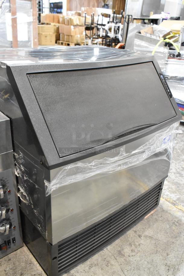 Brand new Manitowoc UDF0310A-261Z stainless steel undercounter ice machine with scratch and dent condition, 286 lb. capacity.