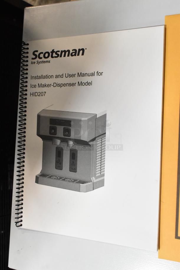 Brand new Scotsman HID207AX-1A manual, for compact nugget ice machine with touch-free dispensing, shown in image.