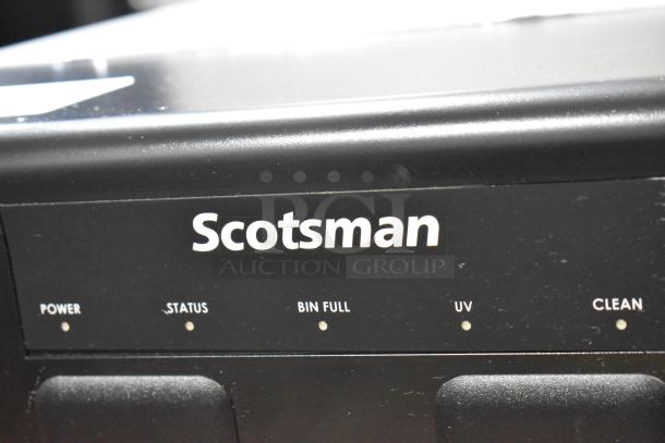 Scotsman HID207AX-1A ice machine, brand new, scratch and dent, with touch-free dispensing, 7 lb bin, 196 lb capacity.