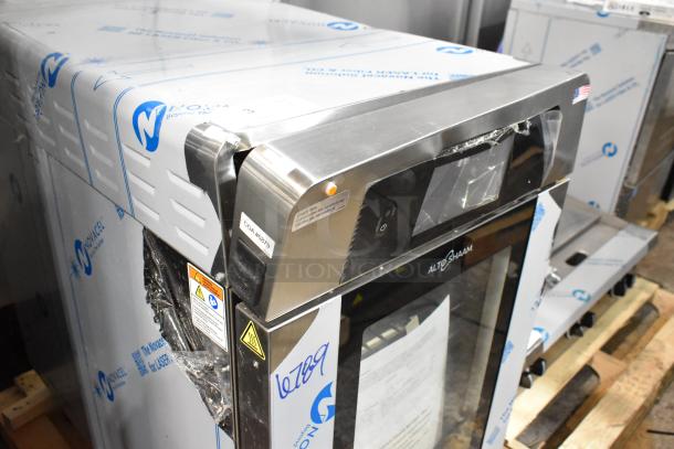 BRAND NEW Alto Shaam VMC-H3H stainless steel commercial oven, 208-240V, 1 phase, with minor dents, protective film intact.