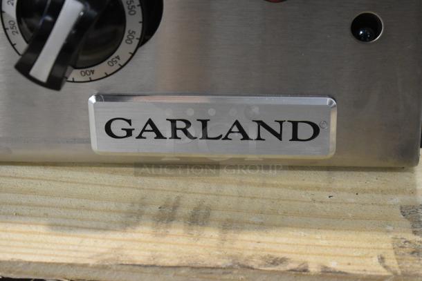 Brand new Garland GTGG36-GT36M stainless steel commercial 36" countertop griddle with thermostatic controls, 84,000 BTU.