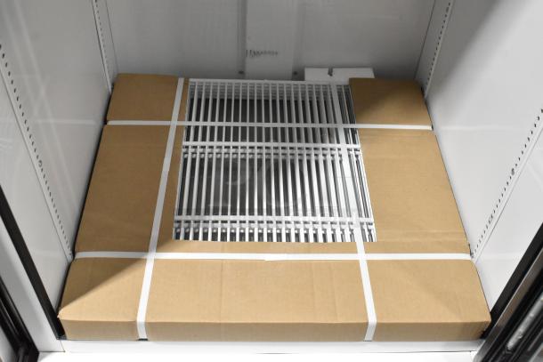Brand new 2021 True TSCI-600R-G-PH commercial cooler, single door, with poly-coated racks. Scratch and dent condition.