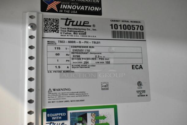 Alt text: True TSCI-600R-G-PH cooler label, showing model, 115V, 1 phase, R290 refrigerant, serial number 10100570.
