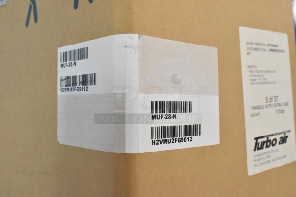 Brand new Turbo Air MUF-28-N stainless steel undercounter freezer box, model, and shipping labels visible.