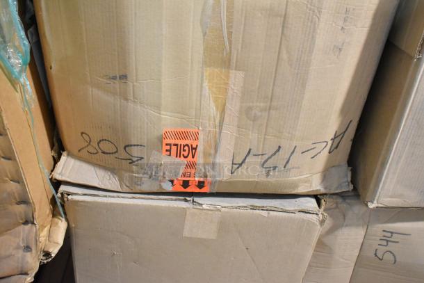Two sealed boxes containing brand new Hoffmann N170116G010 Spectracool Compact units. Orange fragile label visible.