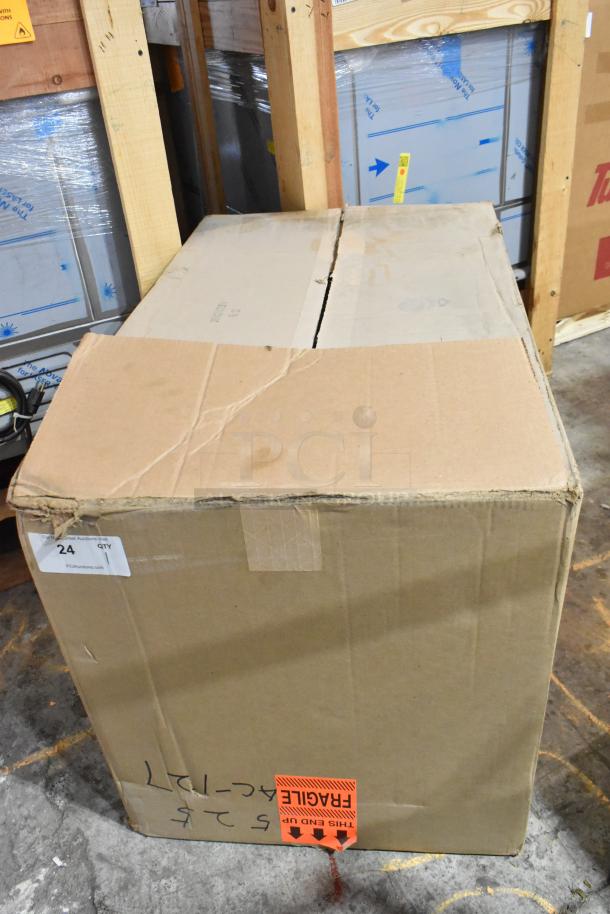 New Hoffmann Spectracool Compact in sealed box. Model STI-10101, 1025 BTU, 110/115V, 1 Phase. Fragile label visible.