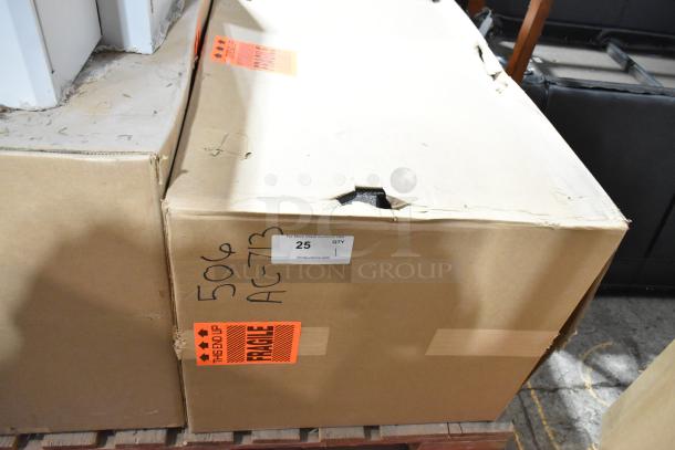 Brand new Hoffmann Spectracool N170116G010 in box. 1025 BTU, indoor use, 110/115V, 1 phase. Fragile label visible.