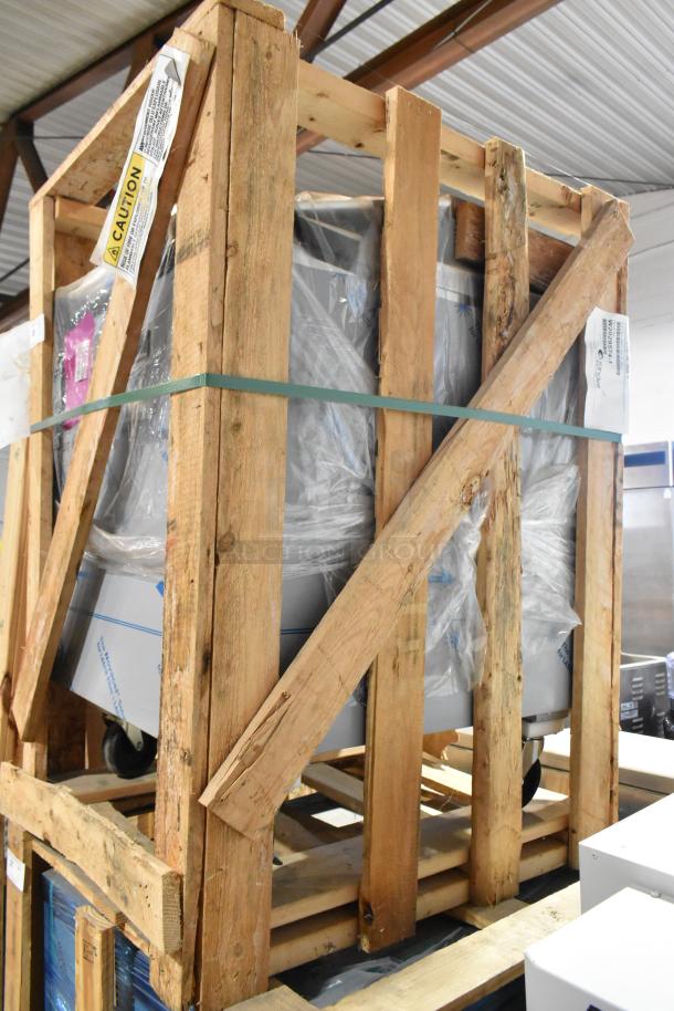 Brand new Randell 9404F-290JIBR stainless steel undercounter freezer in crate. Single door, 115 volts, no casters included.