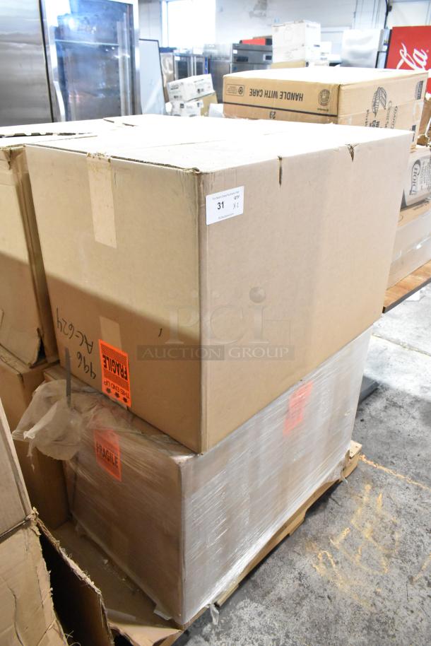 Brand new Hoffmann N170116G010 Spectracool Compact units in sealed boxes. 1025 BTU, 110/115V, 1 Phase. Fragile labels visible.