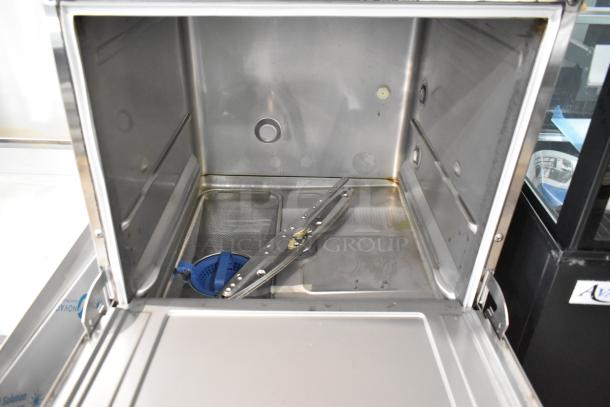 Stainless steel interior of Hobart LXNH dishwasher showing a clean, high-temp commercial undercounter design. 2025 model.