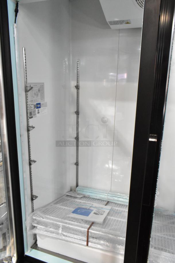 Brand new Avantco 178GDC69HCB glass door merchandiser refrigerator, 78 1/4", with LED lighting, scratch and dent, black metal.