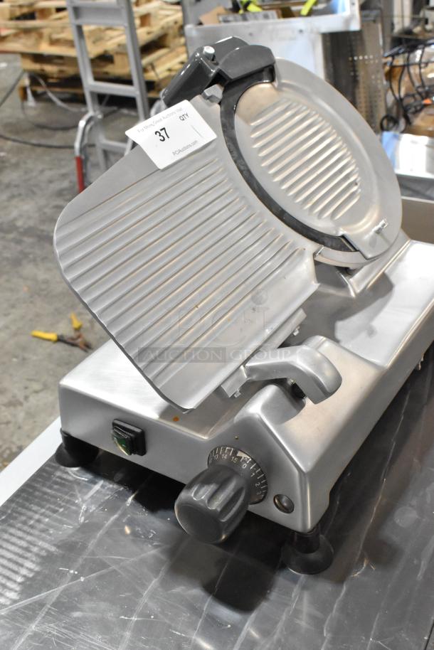 BRAND NEW Hobart EDGE10-11 10" manual meat slicer with blade sharpener, missing arm. Scratch and dent condition, 115V, 1 phase.
