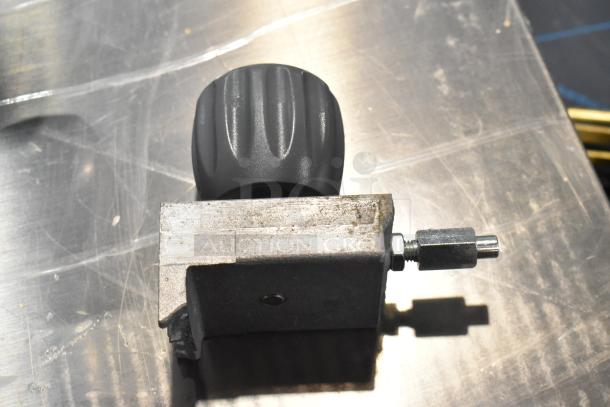 BRAND NEW Hobart EDGE10-11 meat slicer part, scratch and dent condition, missing arm, includes blade sharpener.