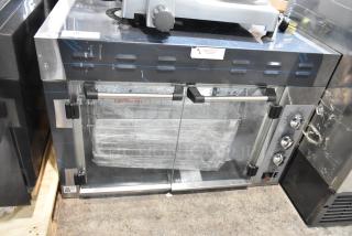Brand new Cooking Performance Group CROE415D electric rotisserie oven, 5-basket, 15-chicken capacity, 240V, 1 Phase.
