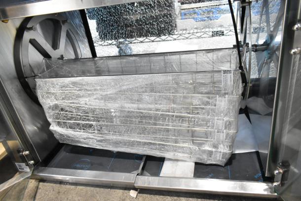 Brand new Cooking Performance Group CROE415D Electric Rotisserie Oven, 5 baskets for 15 chickens, 240V, 1 phase.
