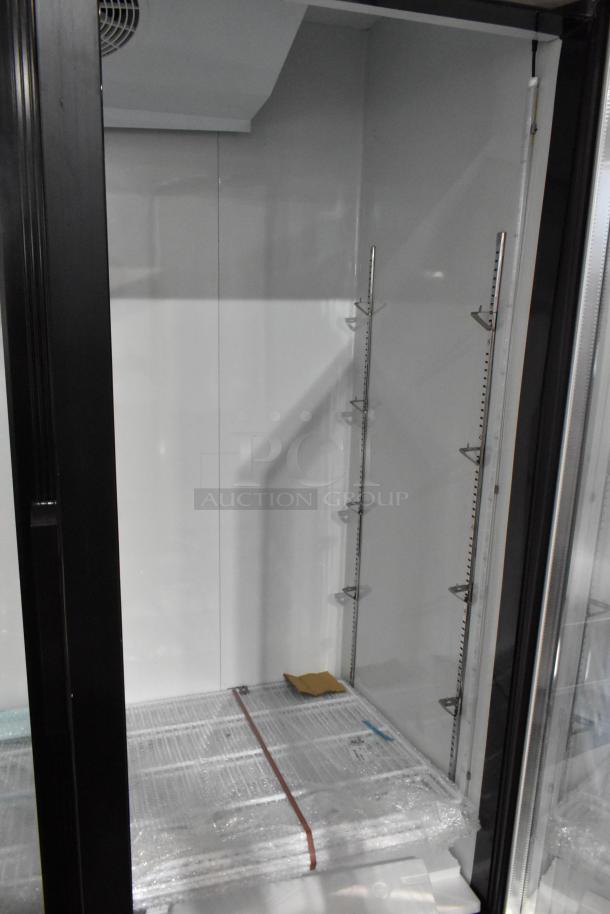 Brand new Avantco 178GDC49HCB glass door merchandiser refrigerator. Black finish, LED lighting, customizable shelving. 115V.