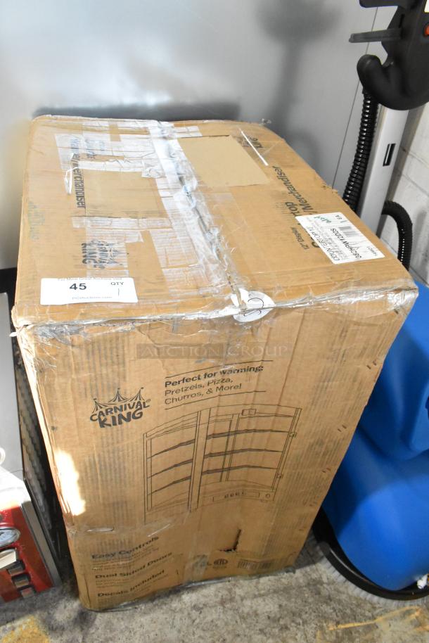 Cardboard box showing Carnival King HPW-12D2S warmer. New with visible scratches and dents. 115 Volts, 1 Phase.