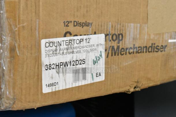Carnival King HPW-12D2S 12" Food Warmer, brand new with scratch and dent; 115V, 1 Phase. Box label shows model number and specs.