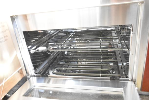 Avantco 177DPO18DS stainless steel double deck pizza/bakery oven, scratch and dent, 240 volts, new condition.