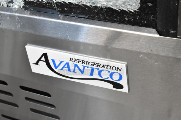 Brand new Avantco 178DLC82HCS 82" stainless steel deli case with curved glass; visible glass damage; 115V, 1 Phase.