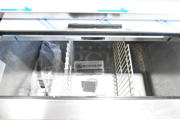 BRAND NEW Beverage Air SF34HC-B 34" black bottle cooler, sliding lid, shallow well, tags visible, 115V, 1 phase.