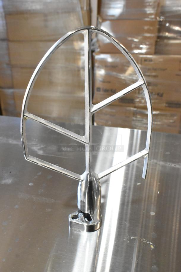 New scratch and dent paddle attachment, metal finish, suitable for mixing. No visible brand markings.