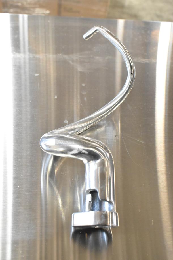 Stainless steel dough hook, brand new with minor scratches, for kitchen mixer. Fits standard attachments.