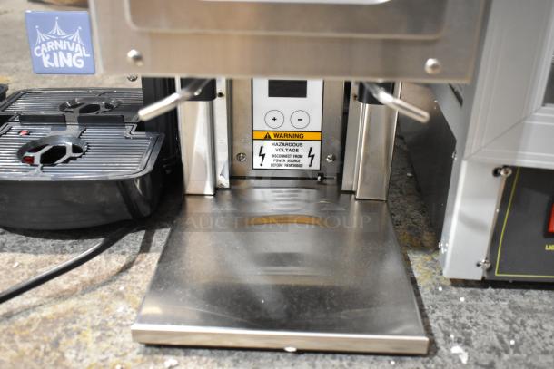 BRAND NEW Bunn G9-2T HD coffee grinder, 2025 model, tall double hopper, portion control. Warning label shows hazardous voltage.