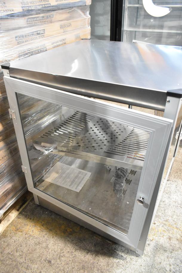 Brand new Carnival King 382HPW18D2S 18" full service warmer; doors do not latch; 120V, 1 phase; scratch and dent condition.
