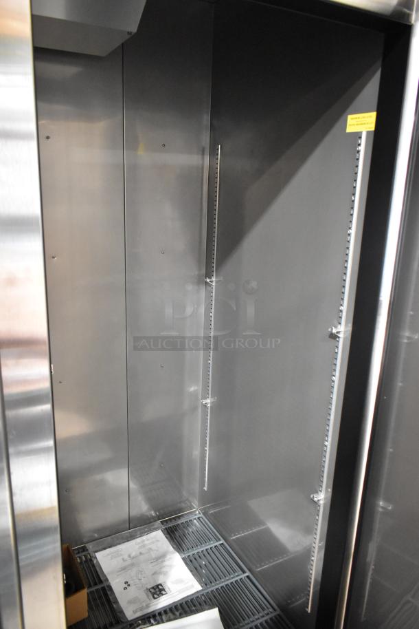 Avantco 447AP49R stainless steel 2-door cooler interior, poly-coated racks, commercial casters, 115V, 1 phase. Brand new.