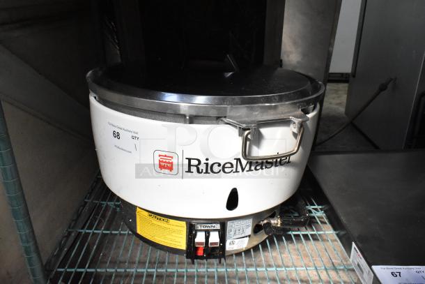 RiceMaster RM-55N-R gas rice cooker, 110 cup, 34,600 BTU, scratch and dent, brand new condition, with control panel and safety labels.