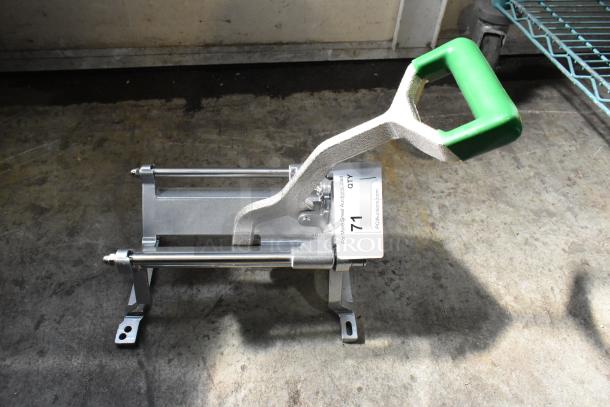 BRAND NEW Garde 181FC38 3/8" French Fry Cutter; heavy-duty, scratch and dent, green handle, mounted on a concrete floor.