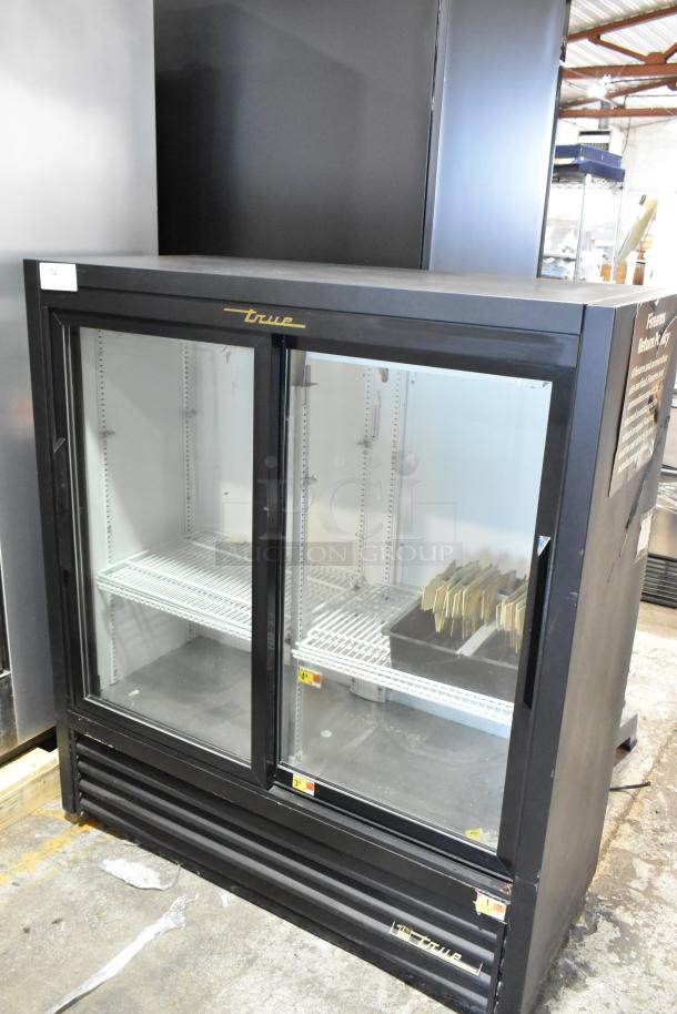 True GDM-41SL-54-LD commercial 2-door cooler, black metal, poly-coated racks, 115V, 1-phase. Model label visible.