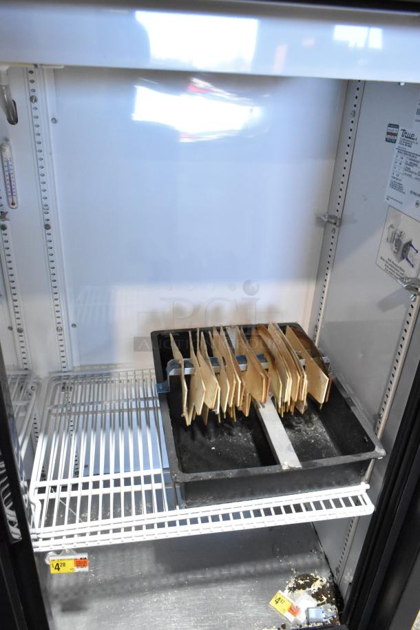 True GDM-41SL-54-LD metal commercial 2-door cooler merchandiser with poly coated racks, model and voltage labels shown.