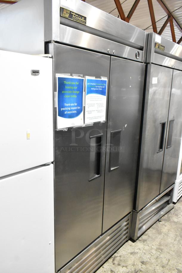 True T-35 stainless steel commercial 2-door reach-in cooler with poly-coated racks, 115 volts, 1 phase, excellent condition.