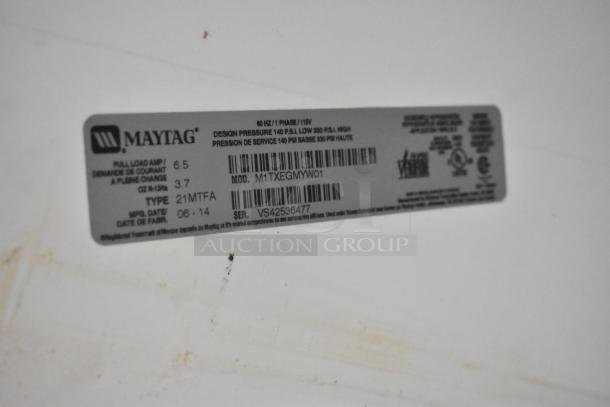 Maytag M1TXEGMYW01 metal cooler with freezer, 115 volts, 1 phase, label shows model and specs.