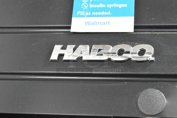 2019 Habco SE18 Metal Commercial Cooler, single door, features poly-coated racks; visible Habco logo.