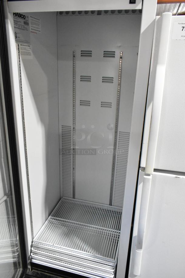 2019 Habco SE18 metal commercial single door cooler with poly-coated racks, 115 volts, 1 phase, good condition.