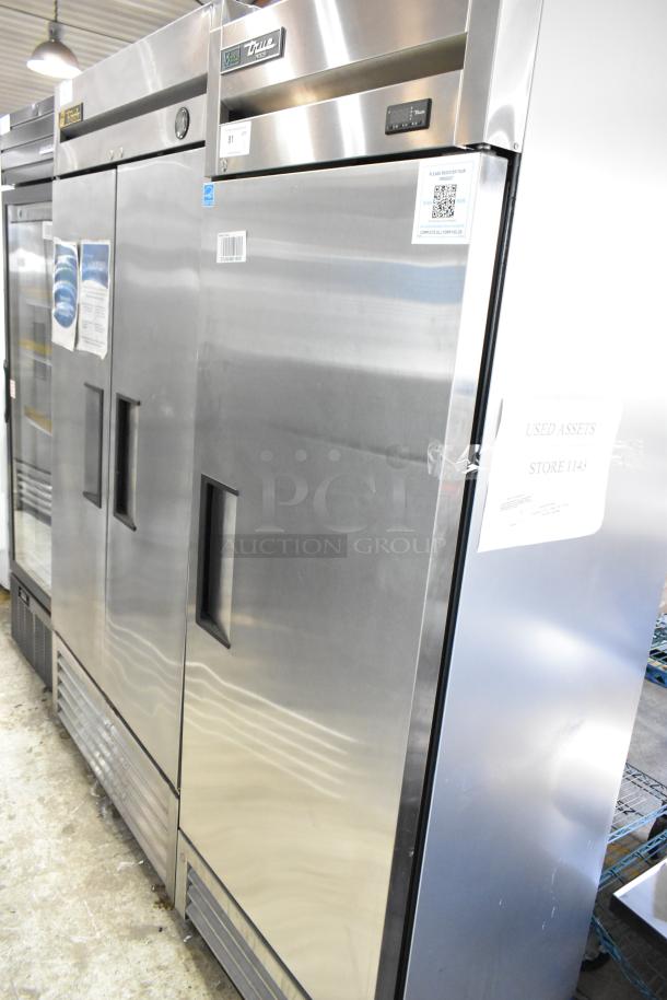 2022 True T-19F-HC stainless steel commercial freezer, single door, poly-coated racks, 115V, 1 phase, excellent condition.