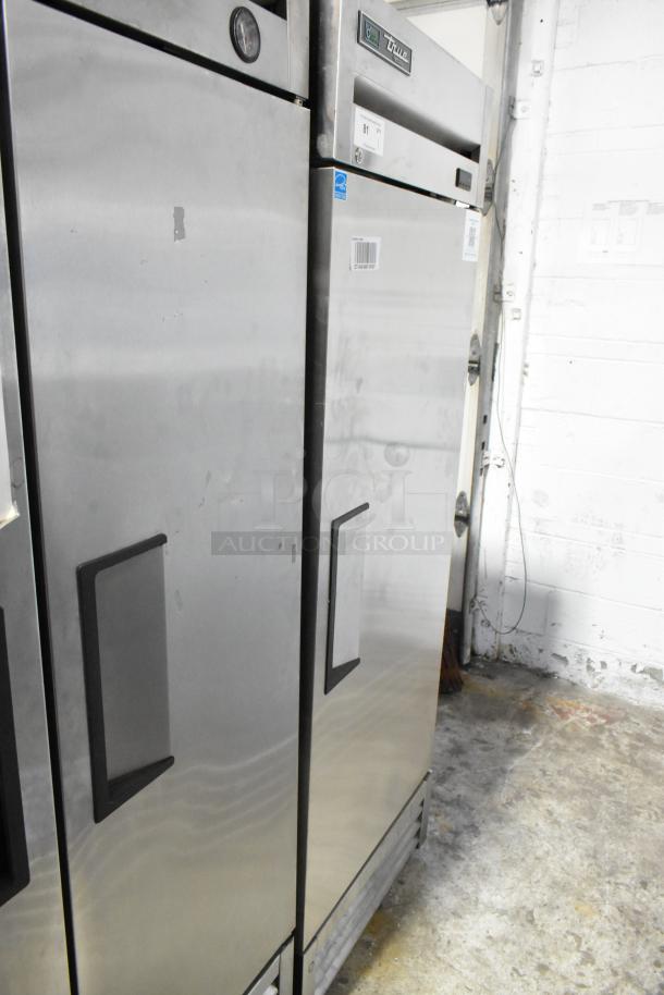 2022 True T-19F-HC stainless steel single door freezer with poly-coated racks, good condition, 115V, 1 phase.