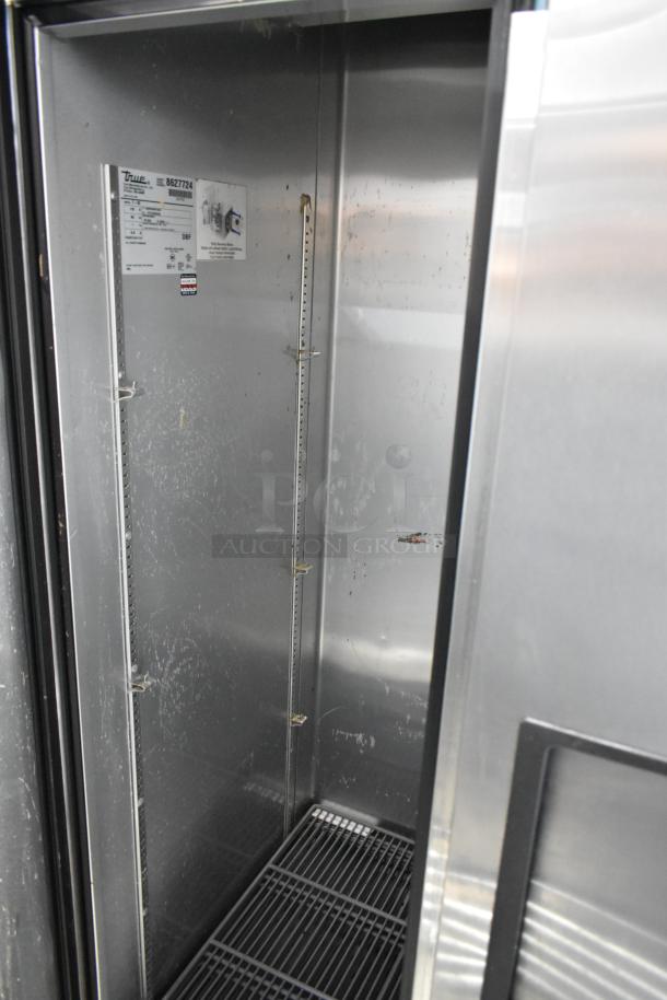 True T-35 stainless steel commercial cooler, 2 doors, poly-coated racks, commercial casters, 115 volts, 1 phase.