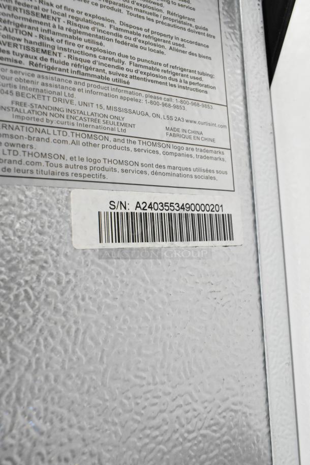 Thomson TFRF690 Single Door Freezer label and serial number showing 115 Volts, 1 Phase; Model TFRF690.