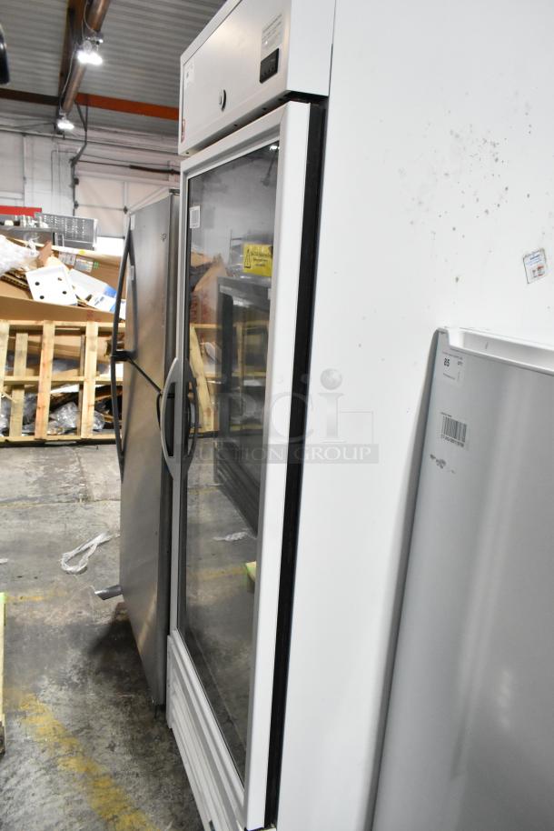 2021 True TSCI-600R-G-PH commercial cooler, single door, metal, poly coated racks, broken glass visible, 115V, 1 phase.