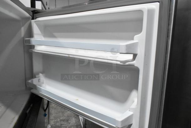 2022 Whirlpool WRT311FZDM02 stainless steel cooler, freezer door shelves, clean interior, 115V, 1 Phase. Ideal condition.